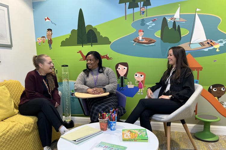 cafcass colleagues in a meeting within a child engagement room